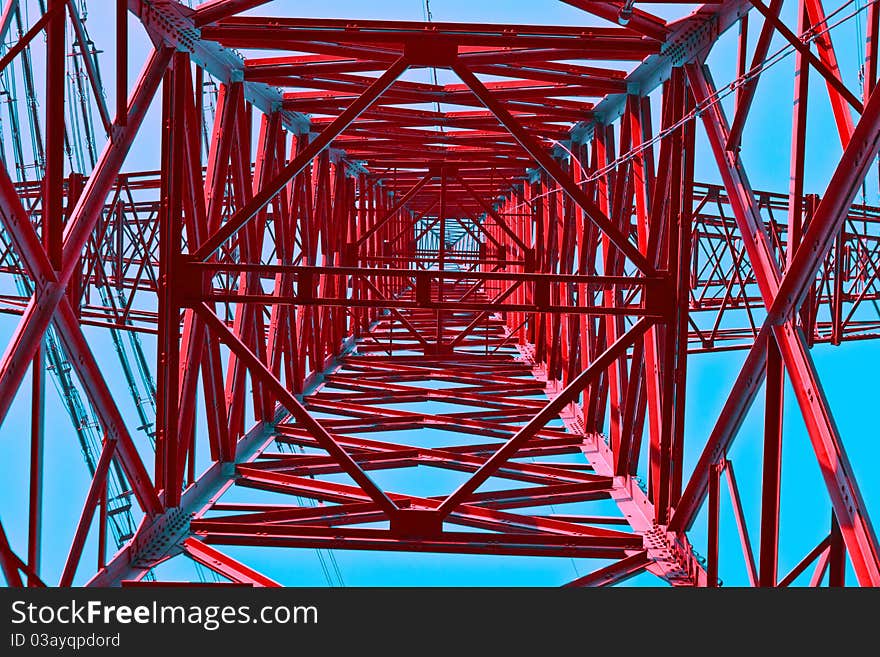 High voltage tower on a background with sky