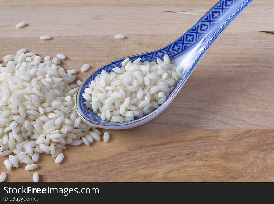 Rice And Porcelain Spoon