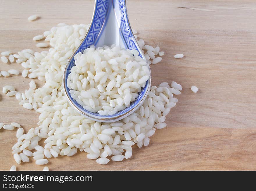 Rice and porcelain spoon