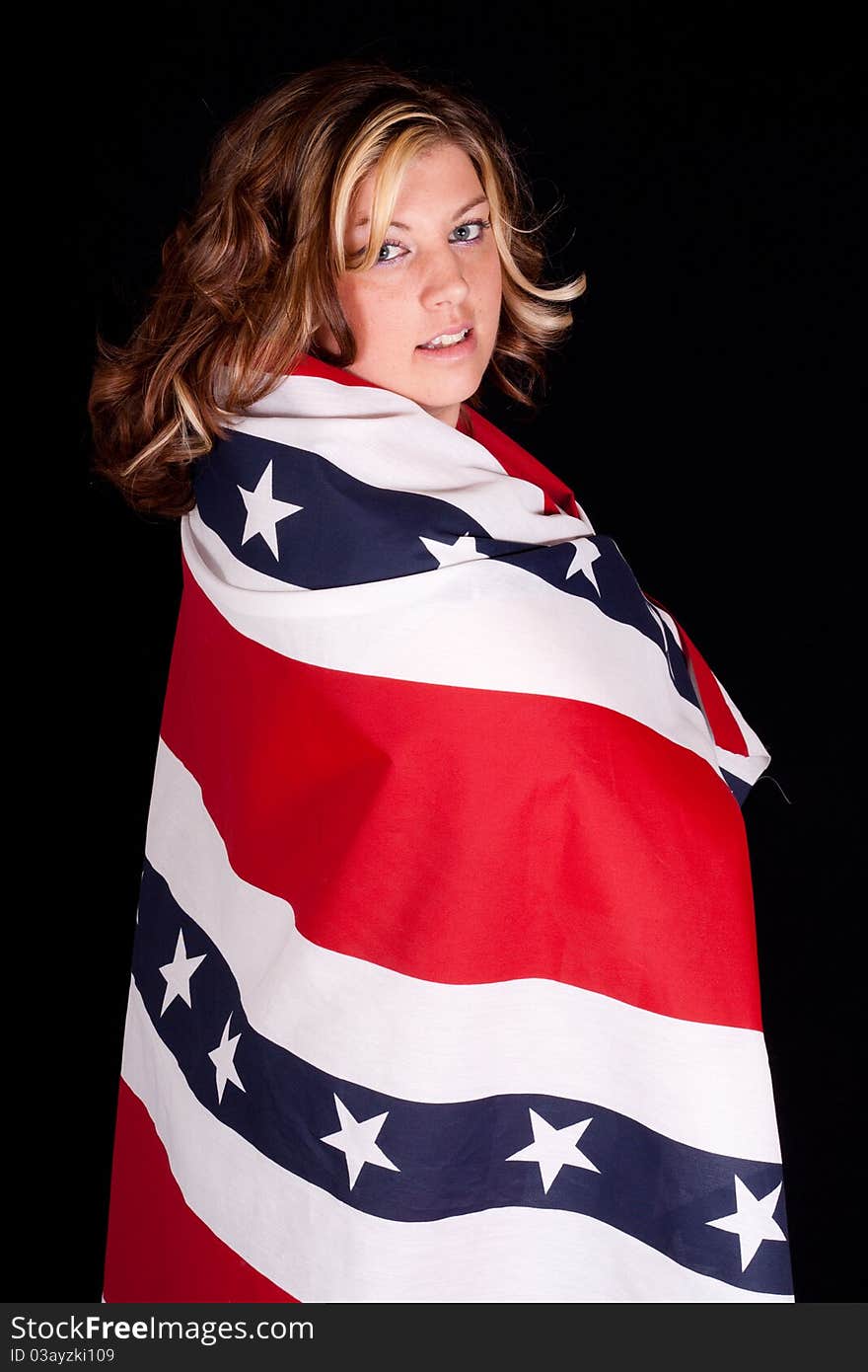 A fourth of july photograph of a cute young women. A fourth of july photograph of a cute young women.