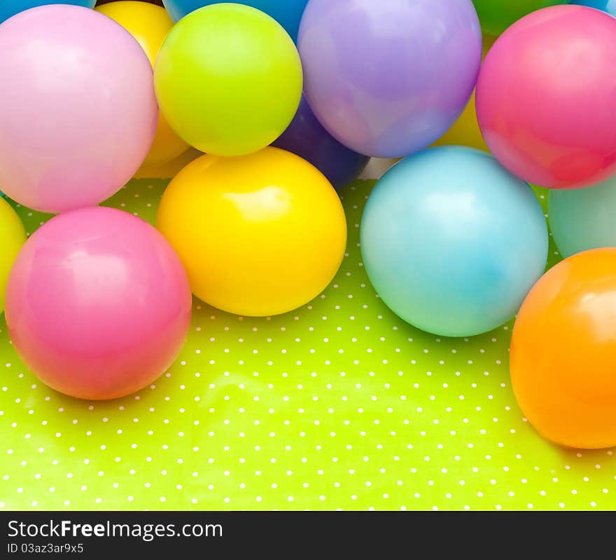 Color balloons on the green background