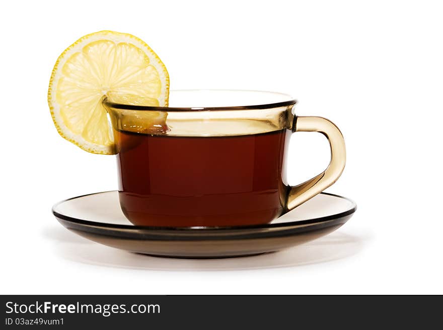 Cup of tea with lemon isolated on a white background