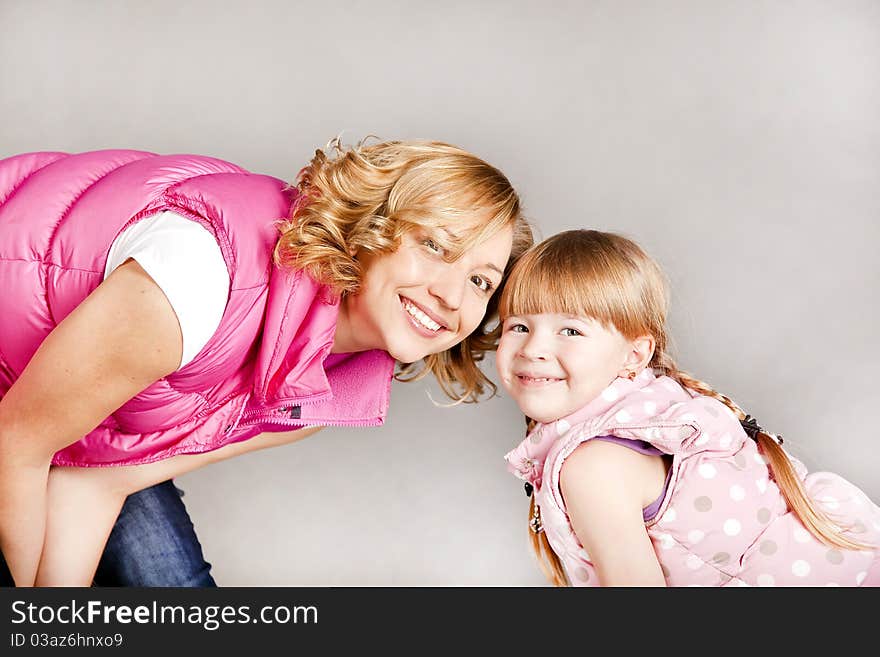 Portrait of two young beautiful girls smiling