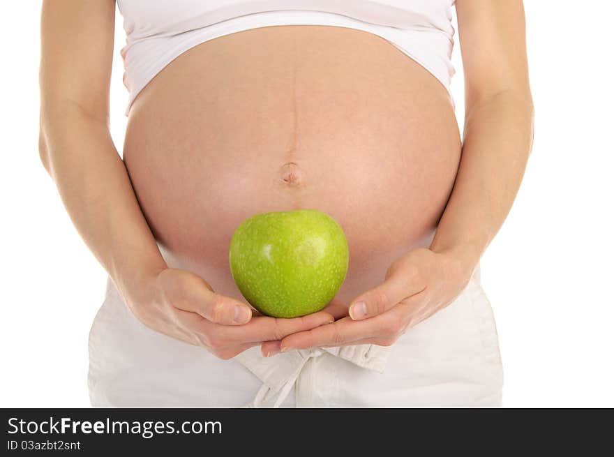 Pregnant woman belly with apple