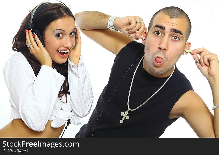 Young couple with headphones and crazy fun. Young couple with headphones and crazy fun