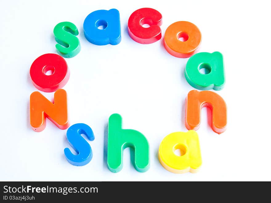 Plastic letters on white background