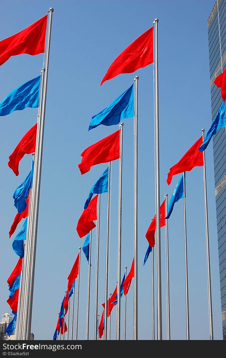 The flags under blue sky