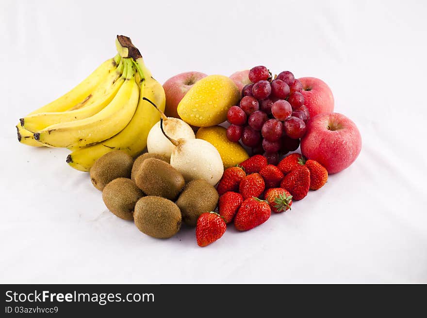 A pile of fruits on pure white.