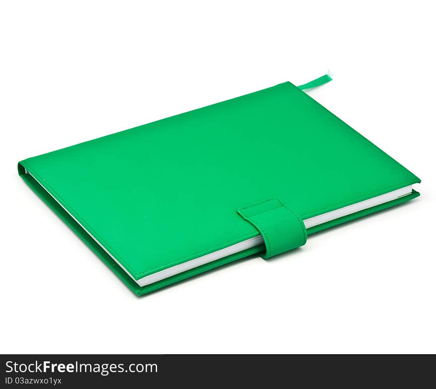 Green book on white background