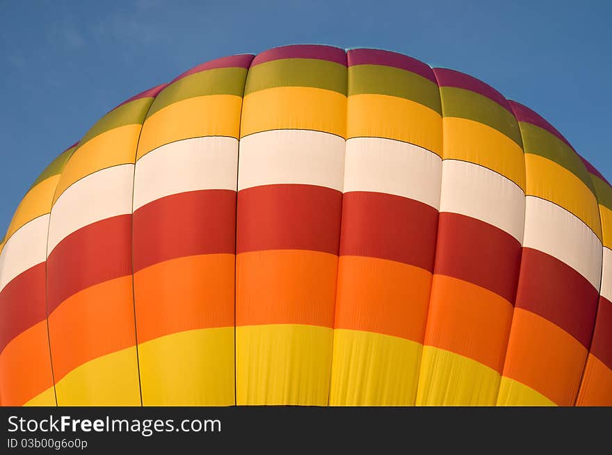 Colorful hot-air balloon with blue sky