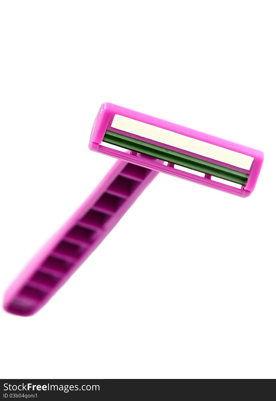 Isolated pink safety razor