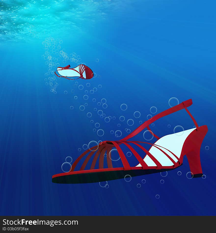 A pair of ladies shoes diving into the blue depth of the sea. A pair of ladies shoes diving into the blue depth of the sea