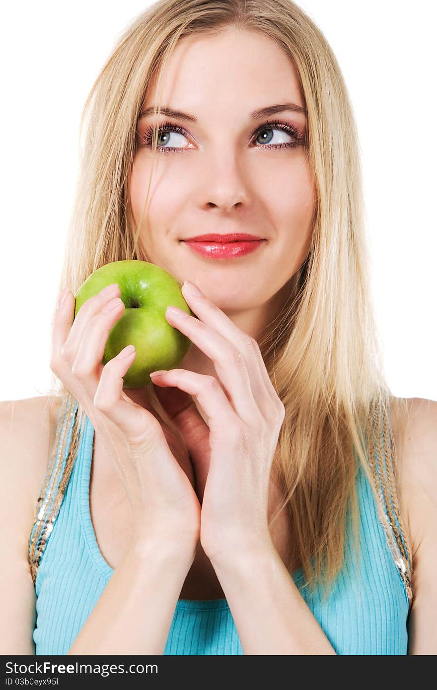 Portrait of lovely girl with green apple against white background. Portrait of lovely girl with green apple against white background