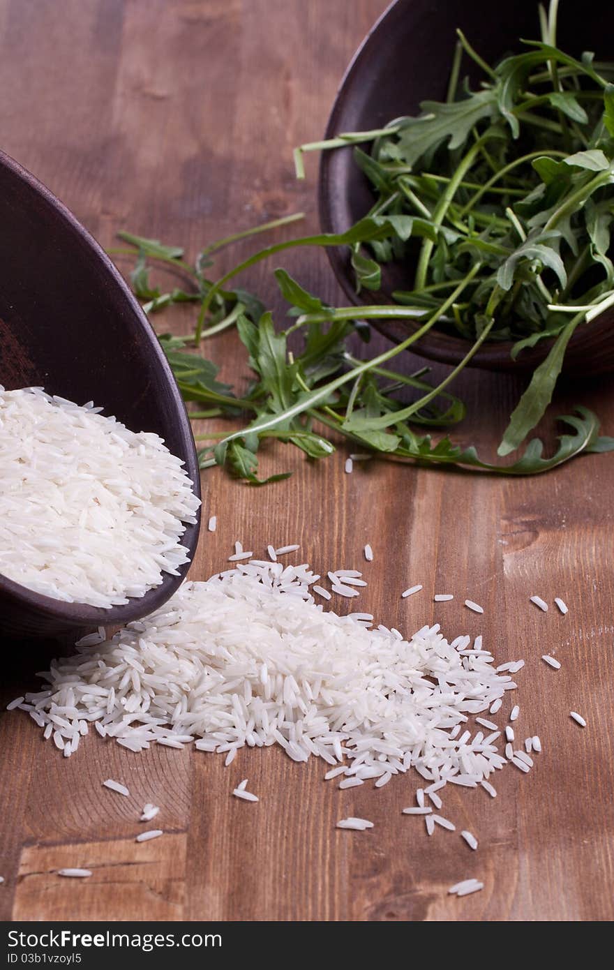 Rice And Rukola In Bowls