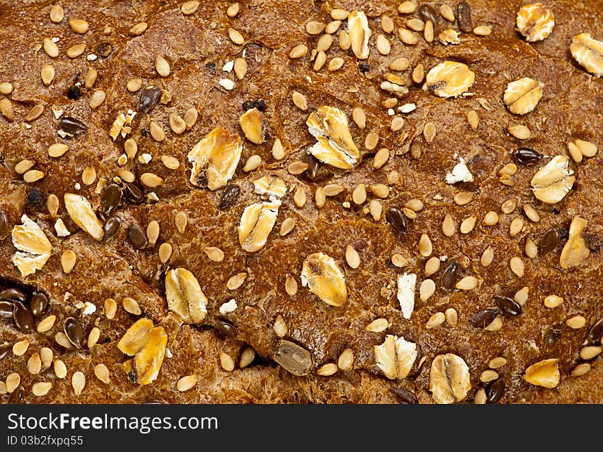 Close-up of bread surface with different seeds