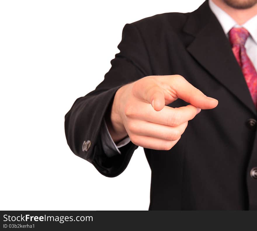 Businessman in suit and tie pointing the finger in front of himself