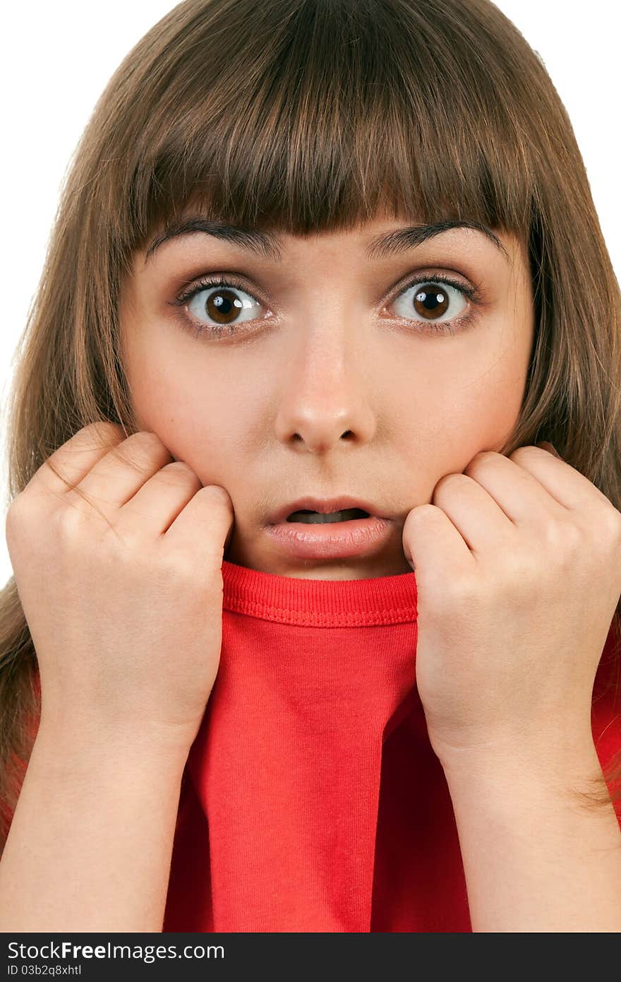 Portrait of the brunette in a red sweater isolated on a white background