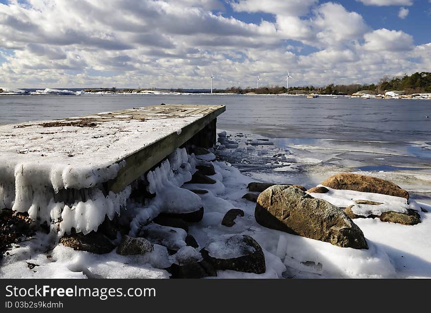 Frosty bridge details with sea bay. Frosty bridge details with sea bay