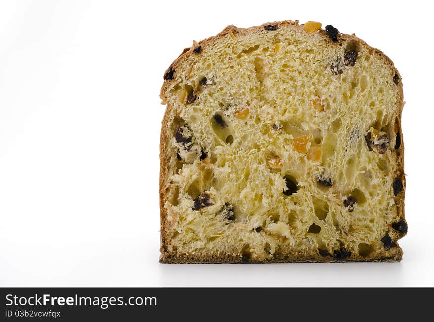 Panettone cut in half on a white background. Panettone cut in half on a white background