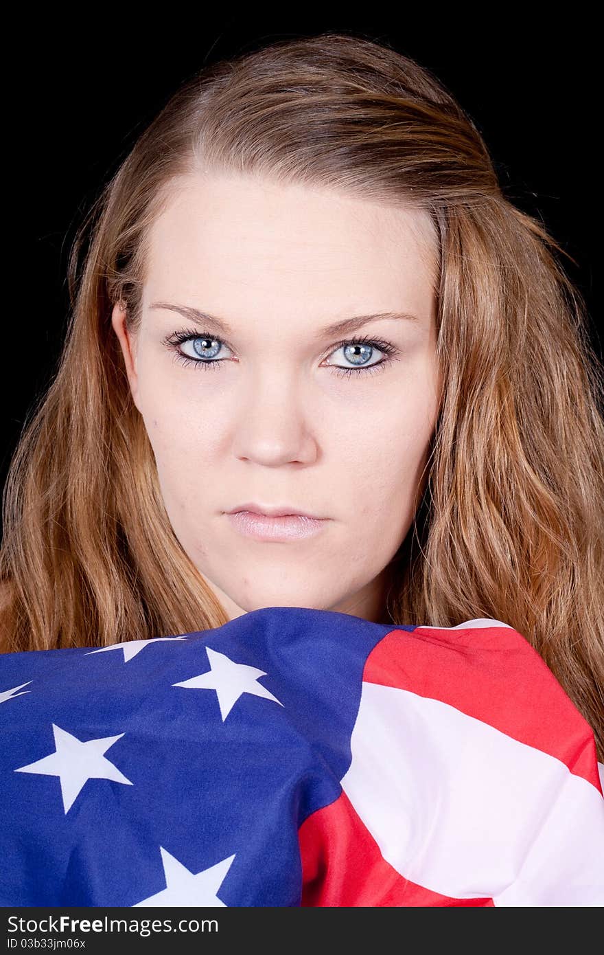 An American girl.  Her soldier is missing and she is only left with this flag. An American girl.  Her soldier is missing and she is only left with this flag.