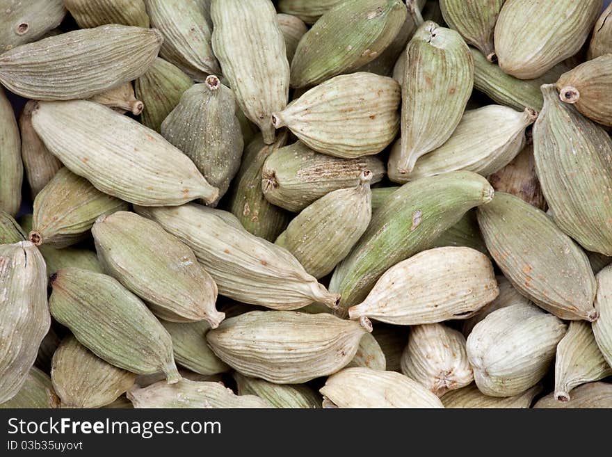 Cardamoms as whole background, macro shot