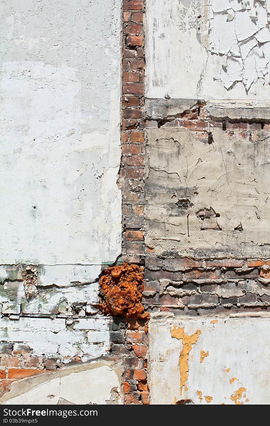 Exposed inner wall of an old demolished building. Exposed inner wall of an old demolished building