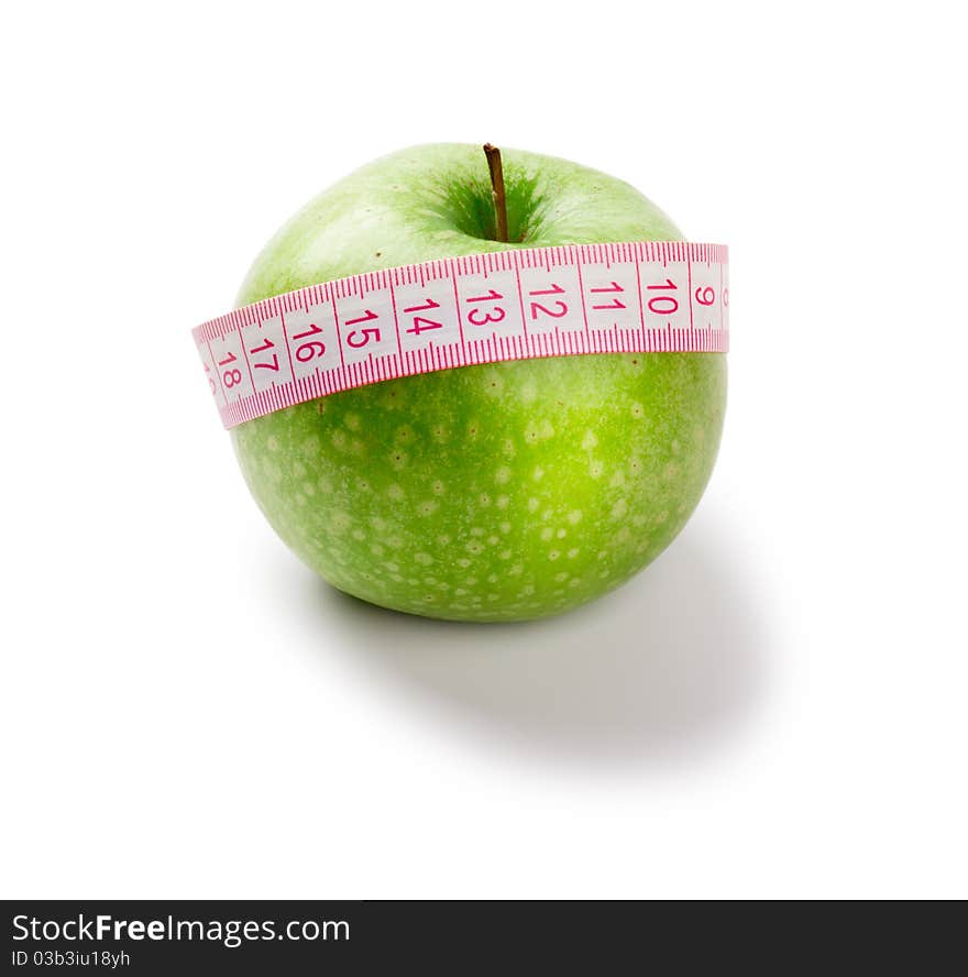 Green Apple And Measuring Tape Of The Tailor