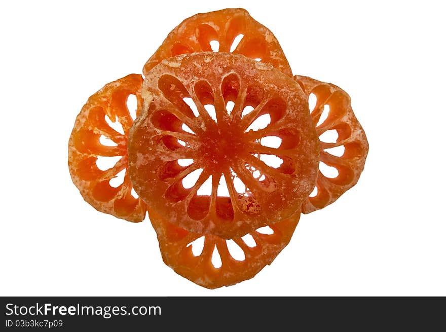 Slices of bael fruit on white background. Slices of bael fruit on white background.