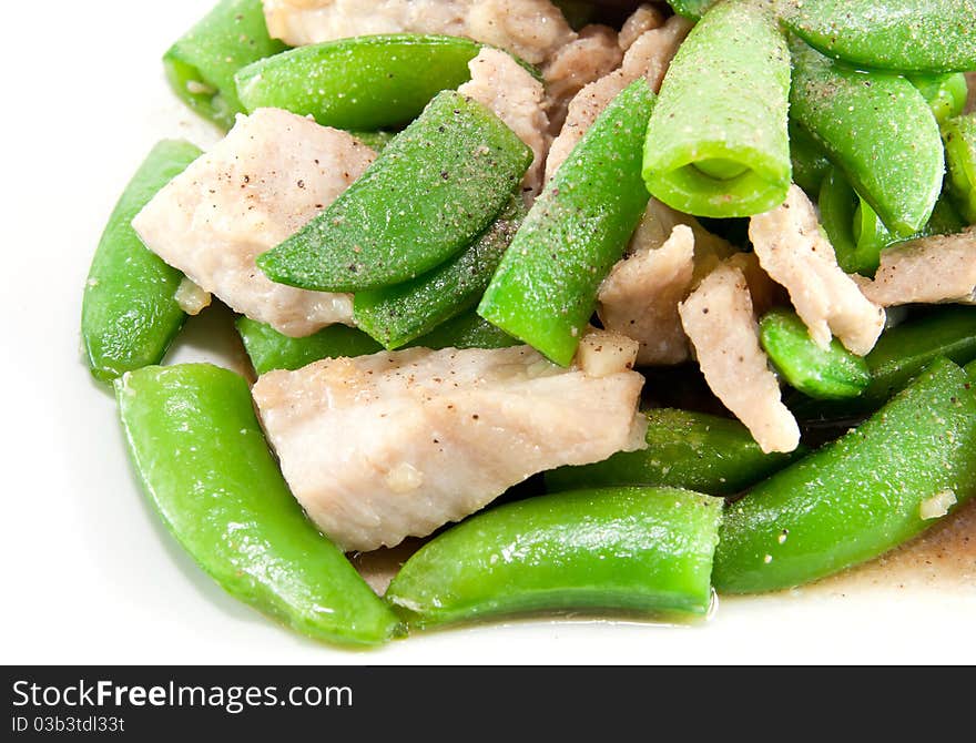 Fried pea and pork thai style