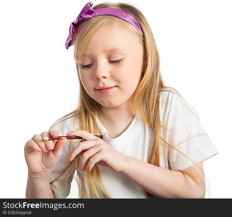 Adorable little girl drawing artwork. Studio shot