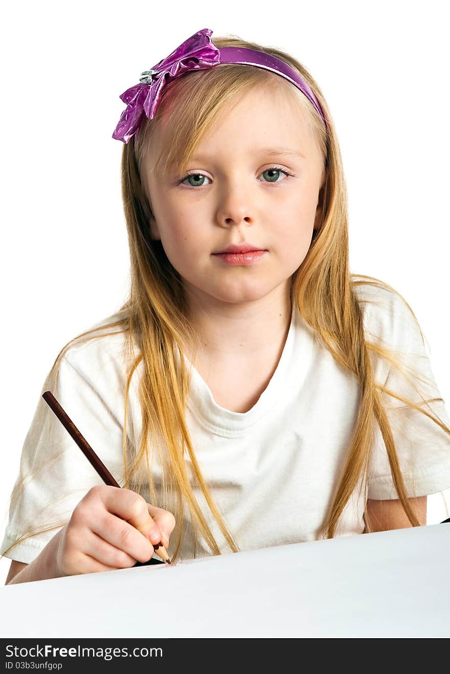 Adorable little girl drawing artwork. Studio shot