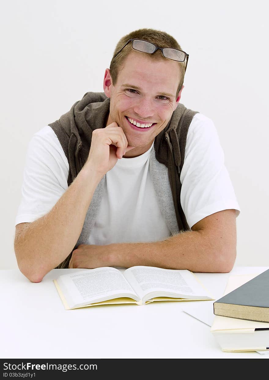 A young student working on his homework