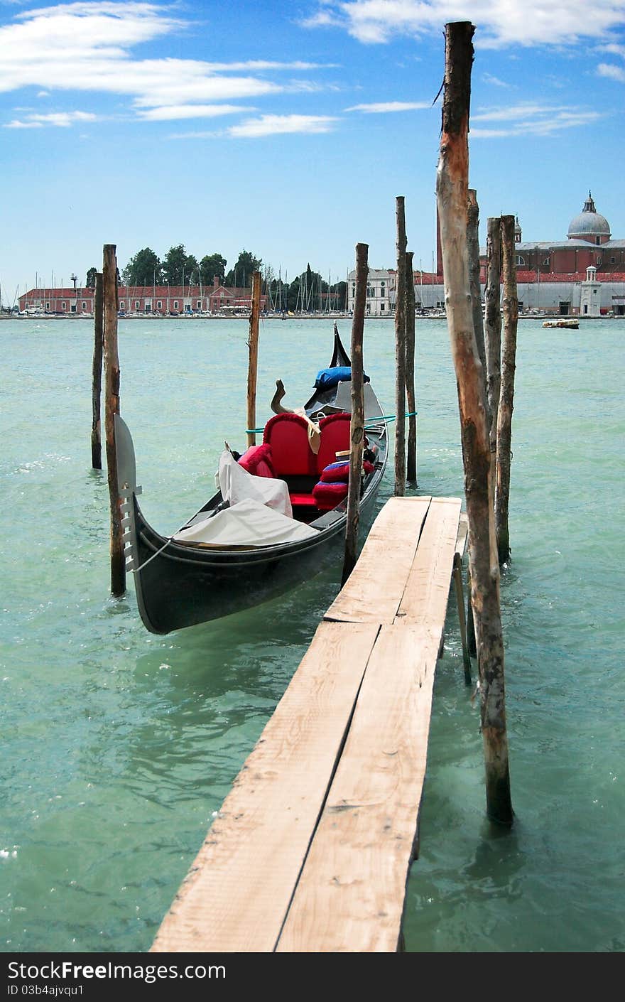 Gondola on Grand Canal in front of San Giorgio Maggiore church in Venice. Gondola on Grand Canal in front of San Giorgio Maggiore church in Venice.