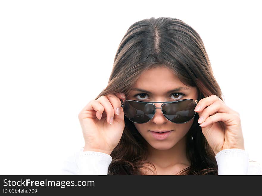 Beautiful fashion woman wearing off sunglasses isolated on a white background