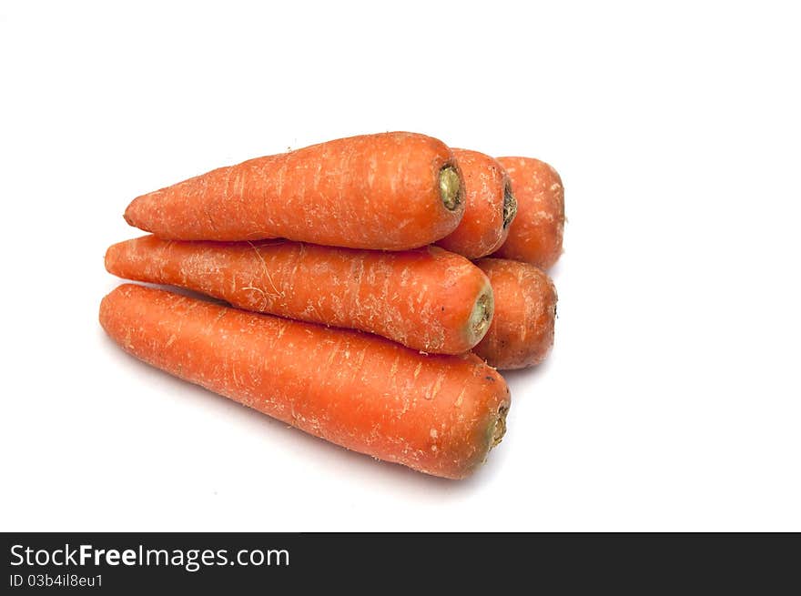 Fresh carrots isolated on a white background