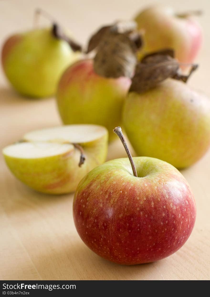 Fresh harvested apples on wooden board. Fresh harvested apples on wooden board