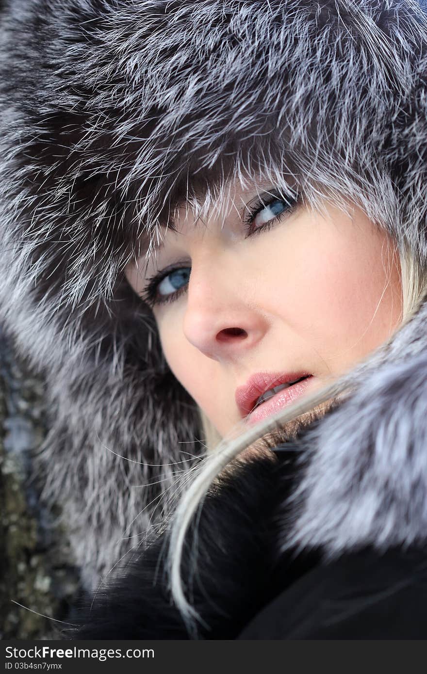 Beautiful woman in winter fur coat. Beautiful woman in winter fur coat