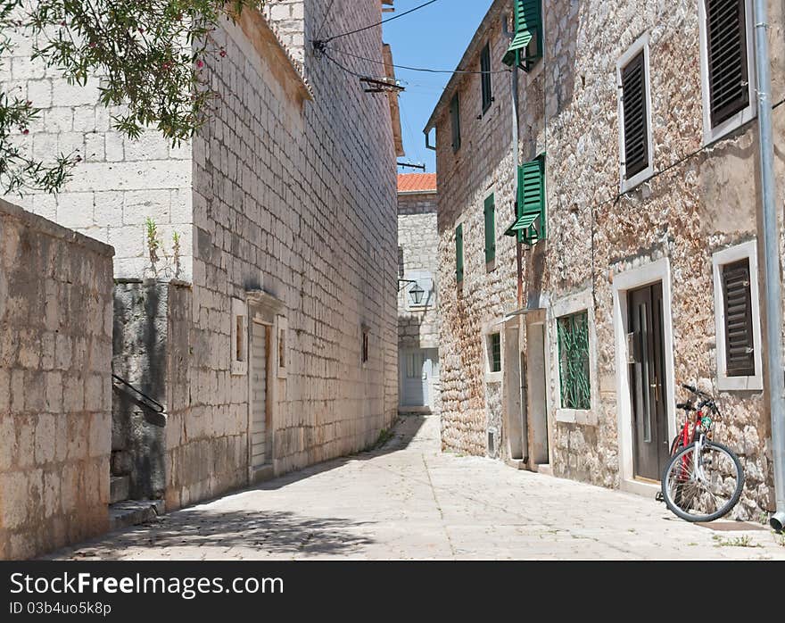 A city view of the croatian city of stari grad on the island of hvar in the adriatic sea. A city view of the croatian city of stari grad on the island of hvar in the adriatic sea