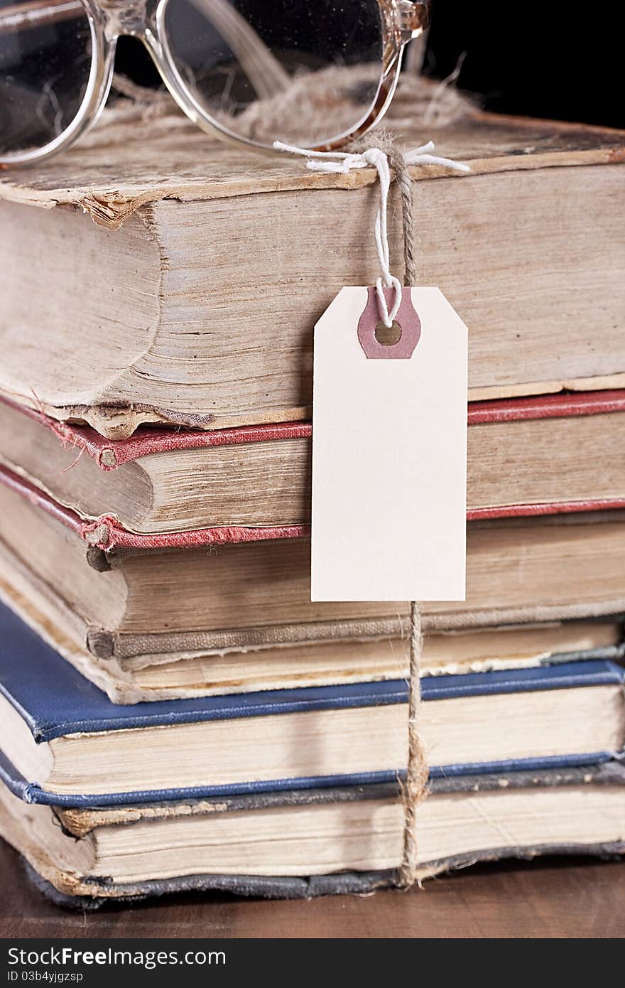 Archival documents in a book-depository are tied up by a cord. Archival documents in a book-depository are tied up by a cord.