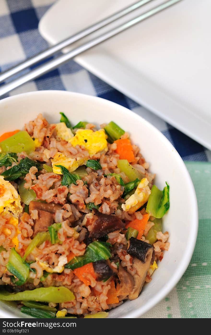 Delicious Oriental fried rice cooked with healthy vegetables. Delicious Oriental fried rice cooked with healthy vegetables.