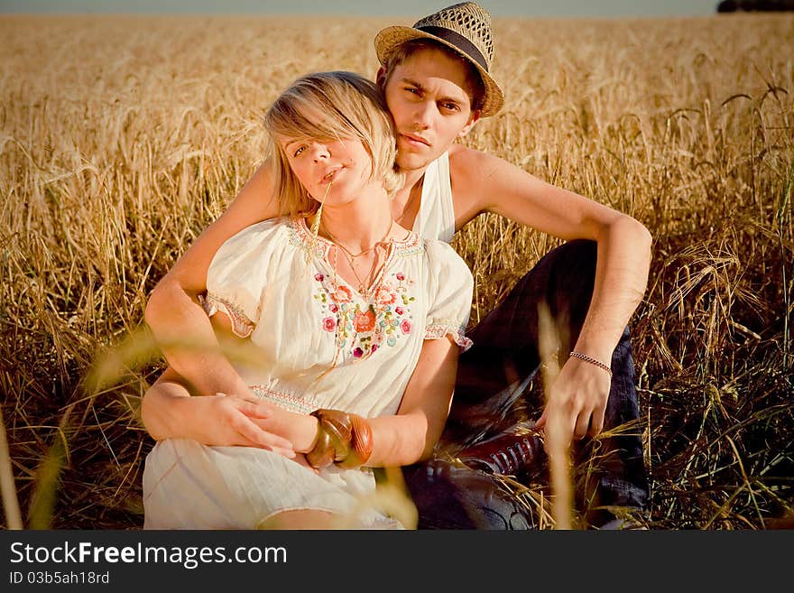 Image of young man and woman on wheat field