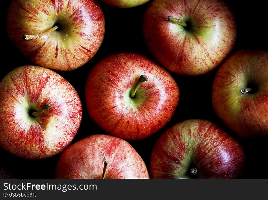 Group of apples on black background