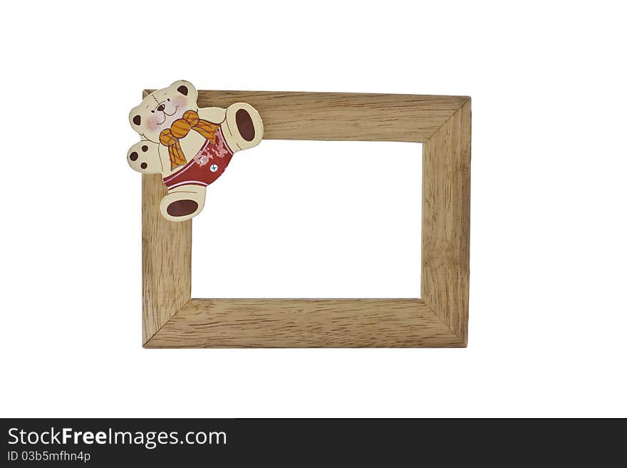 Frame is made of wood has a bear. Frame is made of wood has a bear