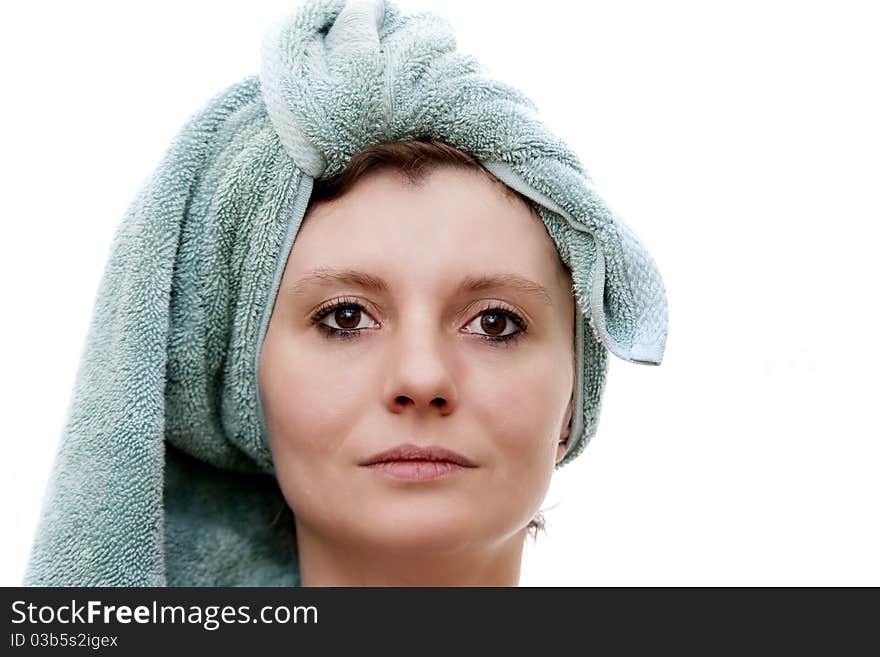 Beautiful woman with a towel on head