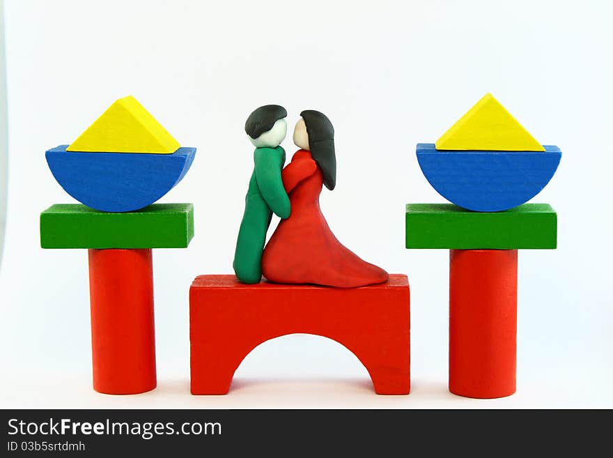 COncept of married day created from color clay and wood toy. COncept of married day created from color clay and wood toy