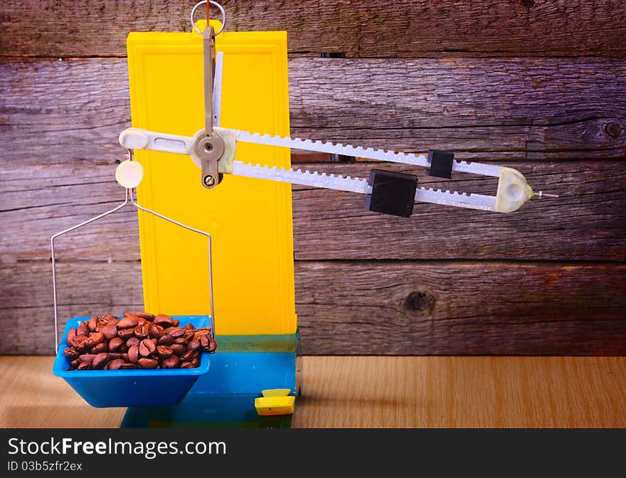 The scale with the coffee beans. Still Life. The scale with the coffee beans. Still Life.