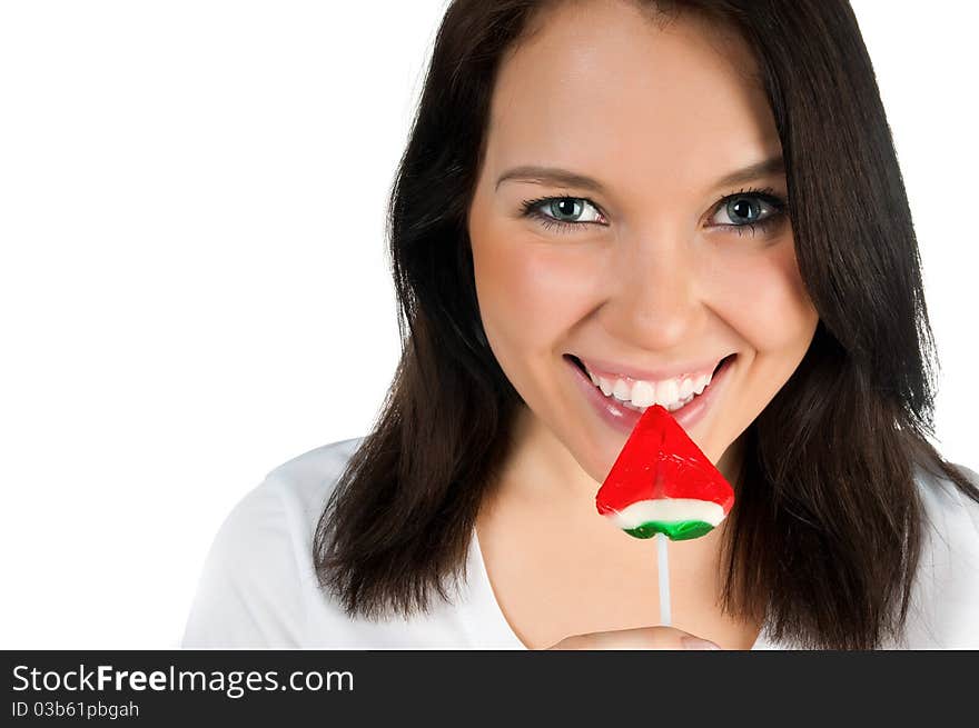 Pretty girl with candy on a white background