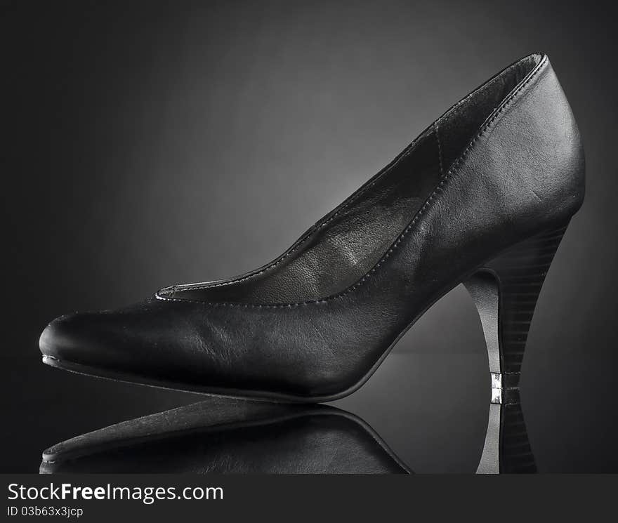 Black shoes with gray background