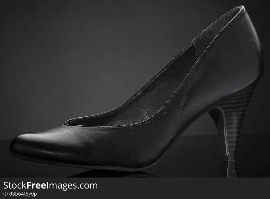 black shoes with gray background. black shoes with gray background