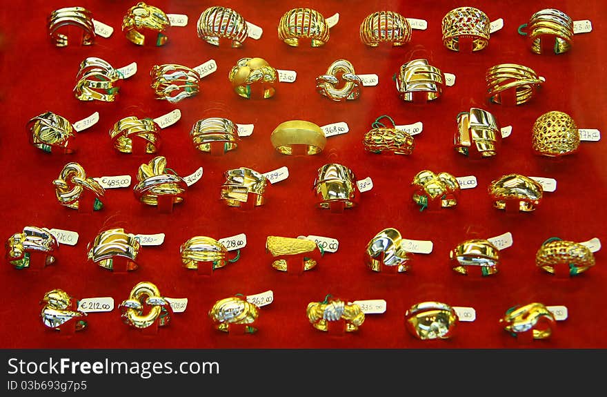 A lot of gold rings and prices. A lot of gold rings and prices